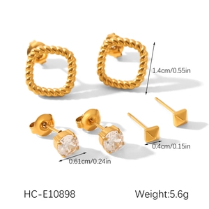 Detailed view of three pairs of gold stainless steel stud earrings with size and weight specs