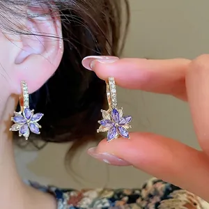 Elegant flower drop earrings with purple and white crystal petals and pavé diamond hoops