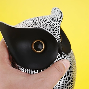 Modern resin owl figurine in black and silver polka dot pattern for home decor