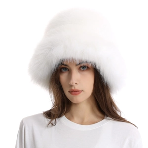 Detail shot of fluffy white faux fur texture on a warm winter bucket hat for women