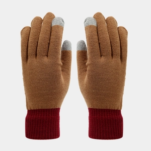 Close-up of knit gloves with three-color patchwork and touchscreen finger tips