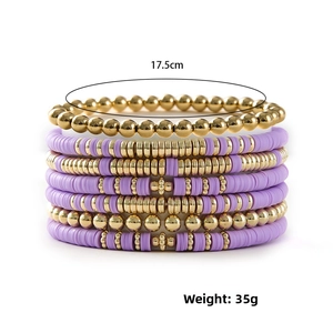 Detail of 6-piece bohemian purple clay and gold bead elastic bracelets, 17.5cm set