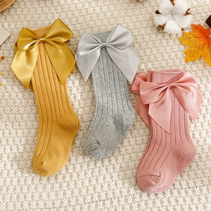 Chaussettes hautes bébé en coton avec grands nœuds en satin, coloris automnaux