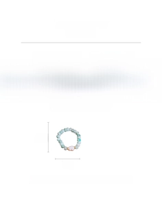 Detailed shot of handmade amazonite bead ring with baroque pearl showing 0.8g weight