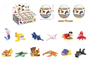 Detailed view of 12 ocean animal building blocks in egg capsules with dimensions