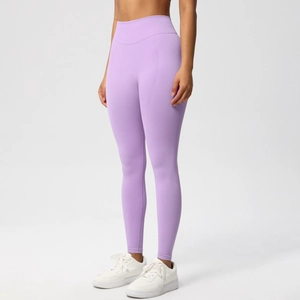 Close-up of high-waist seamless yoga leggings with peach butt lift design in lavender