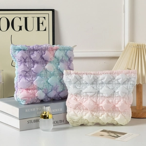 Pastel gradient bubble textured cloud makeup bags with soft ruffled fabric design
