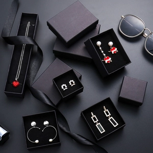 Luxe matte black jewelry gift boxes for necklaces and earrings with elegant black ribbons