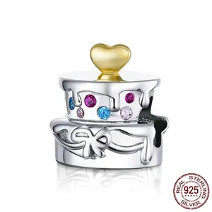 S925 sterling silver cake charm with golden heart and colorful cubic zirconia stones