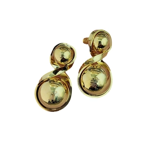 Minimalist gold plated double ball spiral earrings with a polished geometric finish