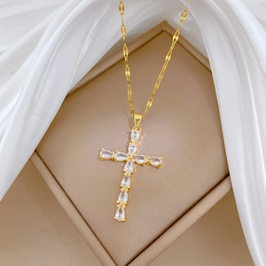 Elegant gold titanium steel cross necklace with shimmering teardrop cubic zirconia crystals