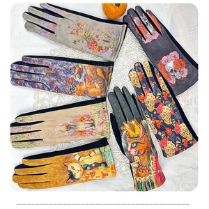 Artistic winter gloves collection with floral cats and skulls on soft suede fabric