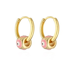 Gold hoop earrings with pink enamel evil eye cube charms on a white background