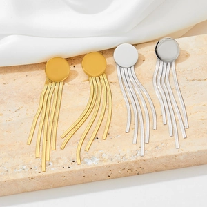 Modern metallic disc tassel earrings in gold and silver finish with flat snake chains