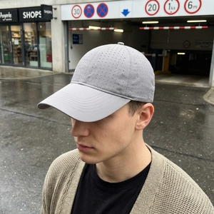 Breathable gray laser-cut baseball cap with extended brim for outdoor sun protection