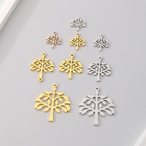 Polished stainless steel Tree of Life pendants in silver, gold, and rose gold finishes