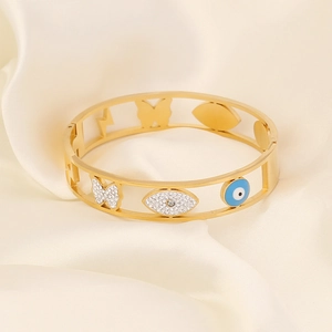 Goldener Edelstahl Armreif mit Schmetterling, blauem Emaille Auge und glänzenden Steinen