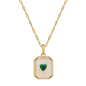 Gold titanium steel necklace with green heart shell pendant and crystal frame detail