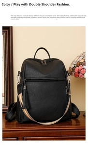 Detail of black vintage leather backpack with secure magnetic flap and striped strap