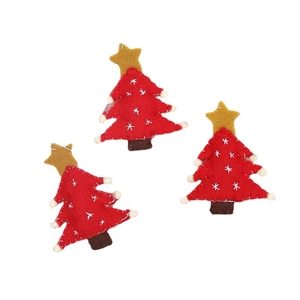 Three handmade red wool felt Christmas tree ornaments with white snowflake embroidery