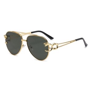 Classic gold aviator sunglasses with leopard head metal carvings and dark lenses