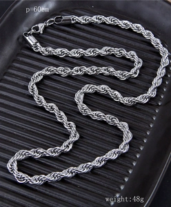 60cm silver twist rope chain necklace weighing 48g displayed on a black textured tray