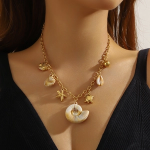 Bohemian gold stainless steel necklace featuring seashell, starfish and turtle pendants