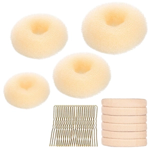 Beige sponge bun maker set with gold U-shaped pins and elastic hair ties on white background