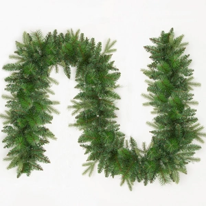 Detail view of 9FT flexible green artificial Christmas garland with realistic pine needles