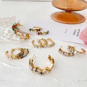 Golden irregular geometric earrings with vibrant colorful square cubic zirconia stones