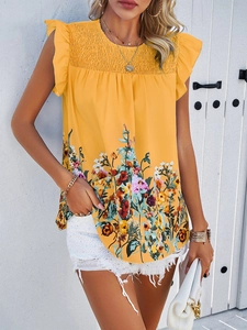 Floral print sleeveless top with smocked neckline and ruffle shoulder details on the model