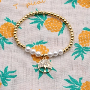 Elegant gold-plated Tree of Life elastic bracelet with pearls and zircon-encrusted charms
