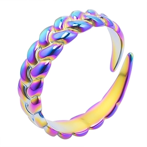 Detail view of woven stainless steel open ring with rainbow gradient plating finish