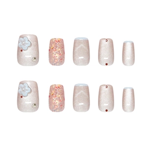 Handmade press-on nails with 3D flower designs and pink-white pearl shimmer finish