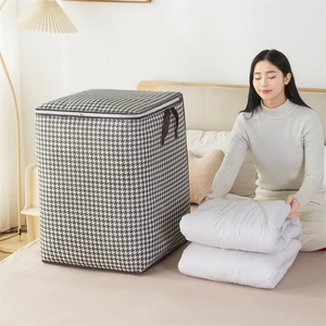 Large houndstooth bedding storage bag with handles for home organization and moving