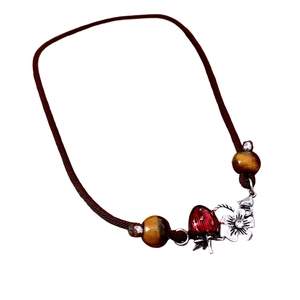 Handmade woven necklace with tiger eye beads and red strawberry enamel flower pendant