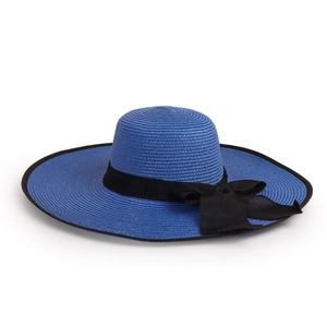 Close-up of blue straw sun hat with black ribbon bow and fine woven texture detail