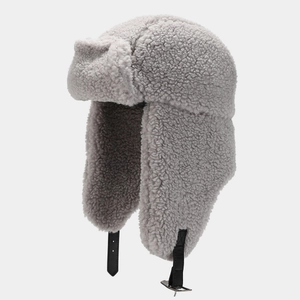Plush grey aviator trapper hat with adjustable leather strap for extreme cold winter