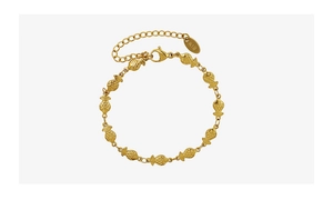 Detailed macro view of 18k gold plated fish charm bracelet with adjustable chain