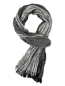 Detail of grey and white striped scarf with crinkle texture and tassel edges