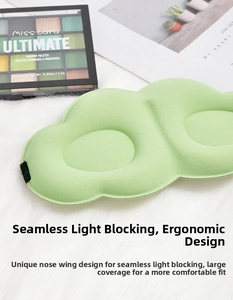 Green 3D cloud sleep eye mask, ergonomic design for total blackout and comfortable wear.