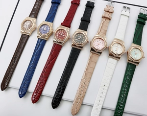 Selection of octagonal crystal-encrusted quartz watches with crocodile texture leather straps