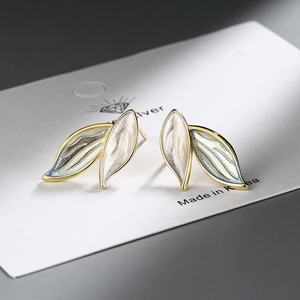 Elegant plant leaf stud earrings with light blue gradient enamel and golden metal frame