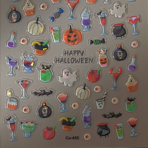 Halloween 3D nail stickers featuring pumpkins, ghosts, and bats for festive manicure art