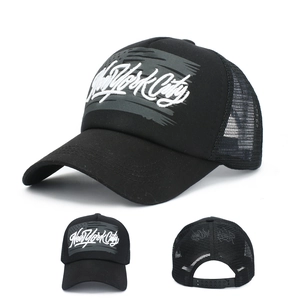 Black mesh trucker hat with New York City embroidery and American flag detail