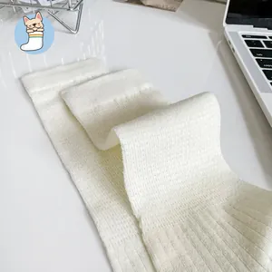 Close-up of white ribbed knit combed cotton socks with soft texture and seamless finish