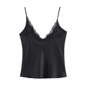 Detail of black satin camisole featuring delicate lace trim and thin shoulder straps