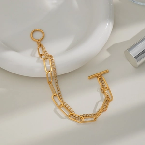 Double-layered 18K gold plated stainless steel chain bracelet with a classic OT toggle clasp