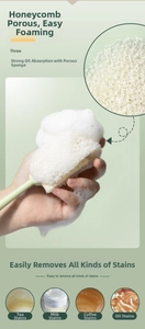Detail of porous sponge bottle brush head with long handle for deep cleaning stains
