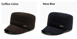 Detail of coffee and navy blue winter flat caps showing tweed texture and metal sports tag
